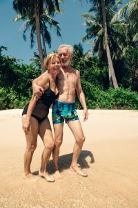 senior couple on a beach in vietnam t20 vR7v3v